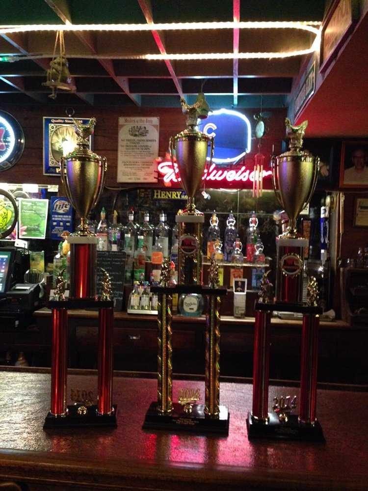 Trophies lined up on the Green Frog Inn bar